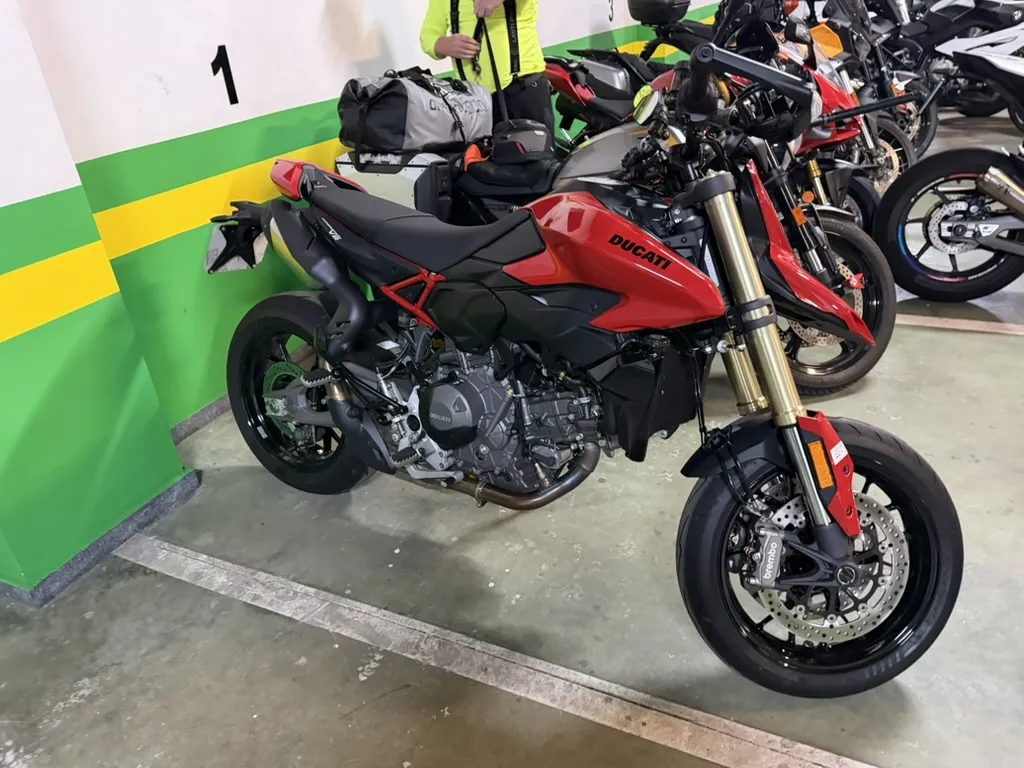 Red Ducati Streetfighter parked in the Santander hotel garage