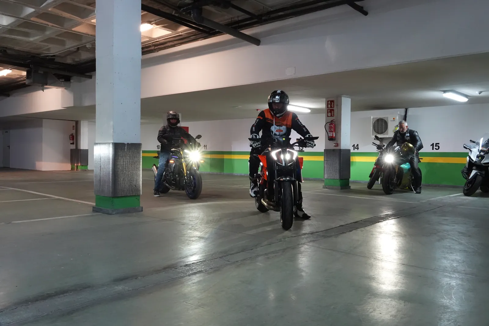 Cannonball riders leaving the Santander hotel garage with headlights on