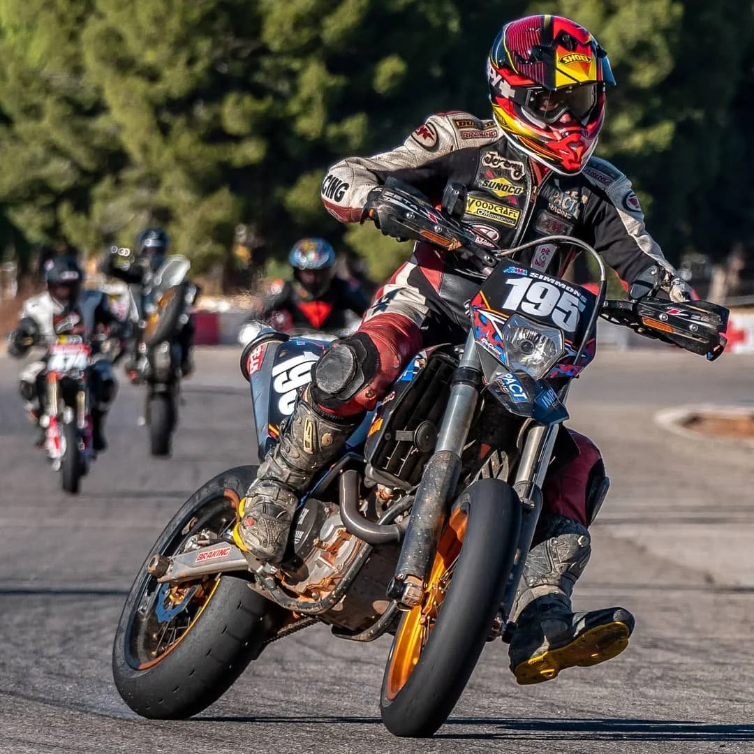Jeremy Simmons on number 195 leading a supermoto race