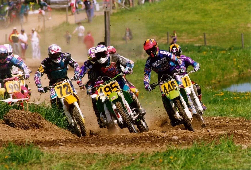 Jeremy Simmons on number 95 racing for the holeshot at a motocross start