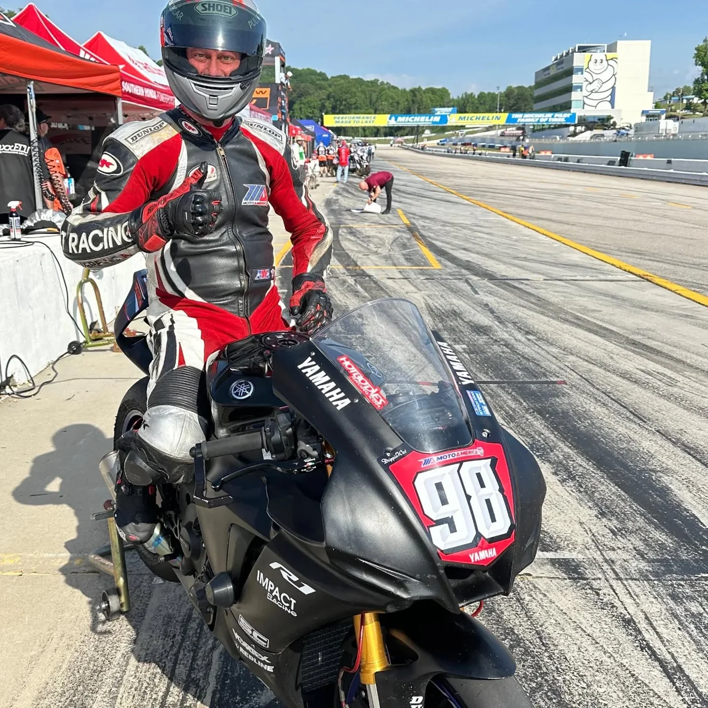 Jeremy Simmons on his number 98 Yamaha sports bike in the pit lane