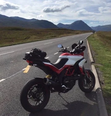 Jim Horne's Ducati Multistrada on the A82 with the mountains of Glencoe ahead