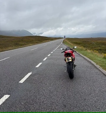 Jim Horne's red Ducati Streetfighter on the A82 towards Glencoe