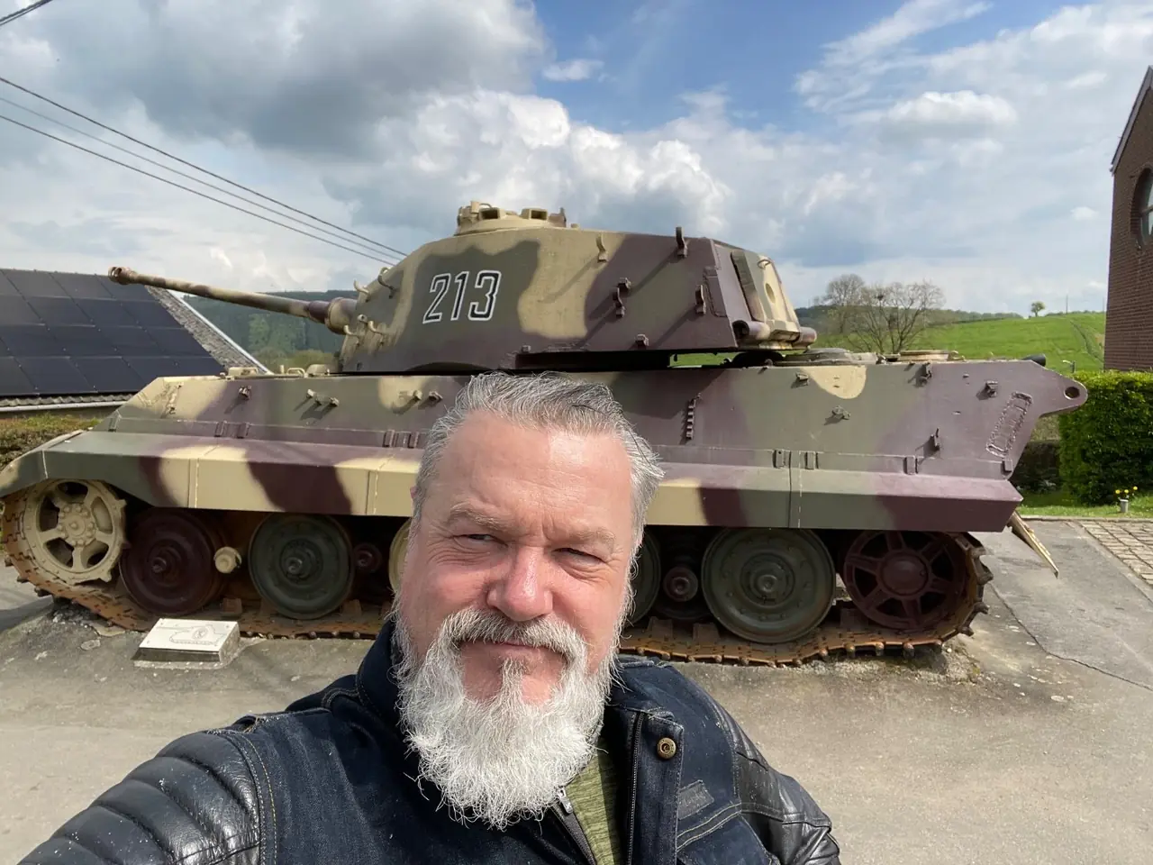 Alan Jones in front of the Tiger II turret number 213 at La Gleize in the Belgian Ardennes