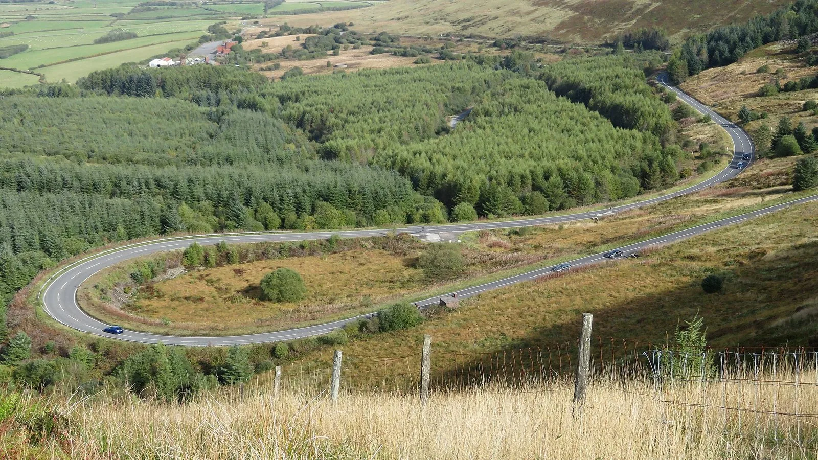 Hairpin bend on the A4061 Rhigos Mountain Road, sweeping round above the forestry towards Treherbert